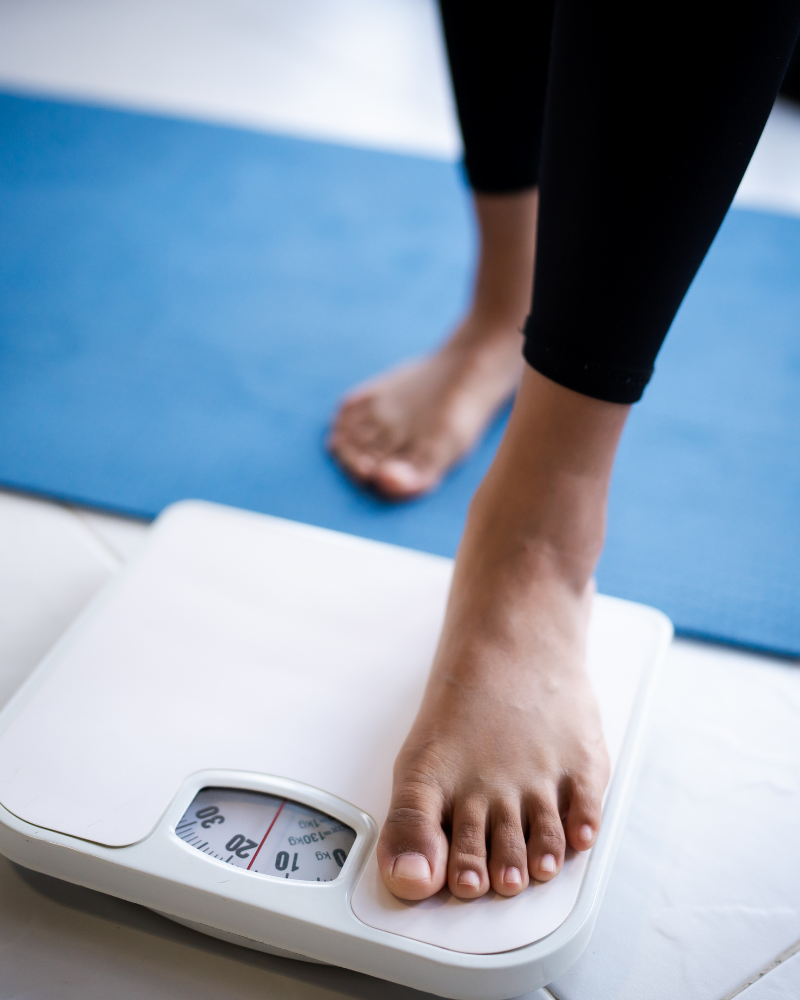 Chiropractor stretching a patient's back
